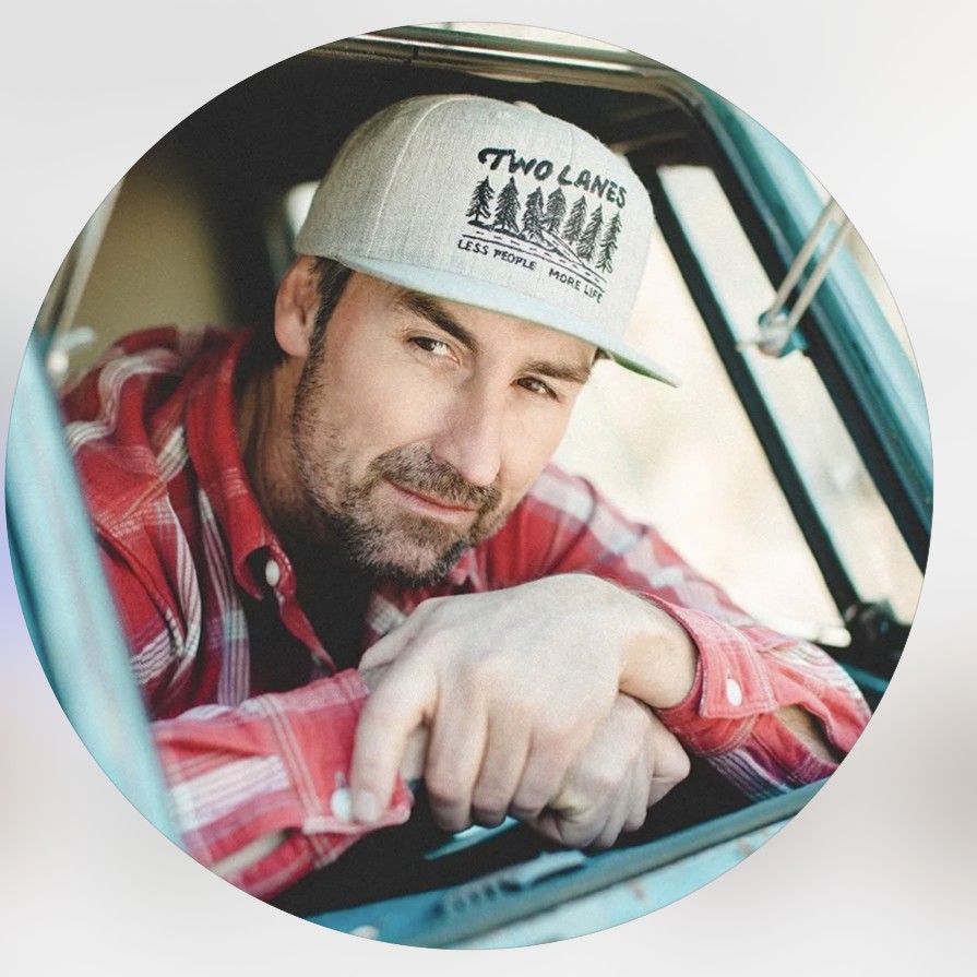 Mike Wolfe wearing a Two Lanes trucker hat