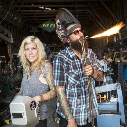 Neon sign maker Jay Gordon at work with a welding torch